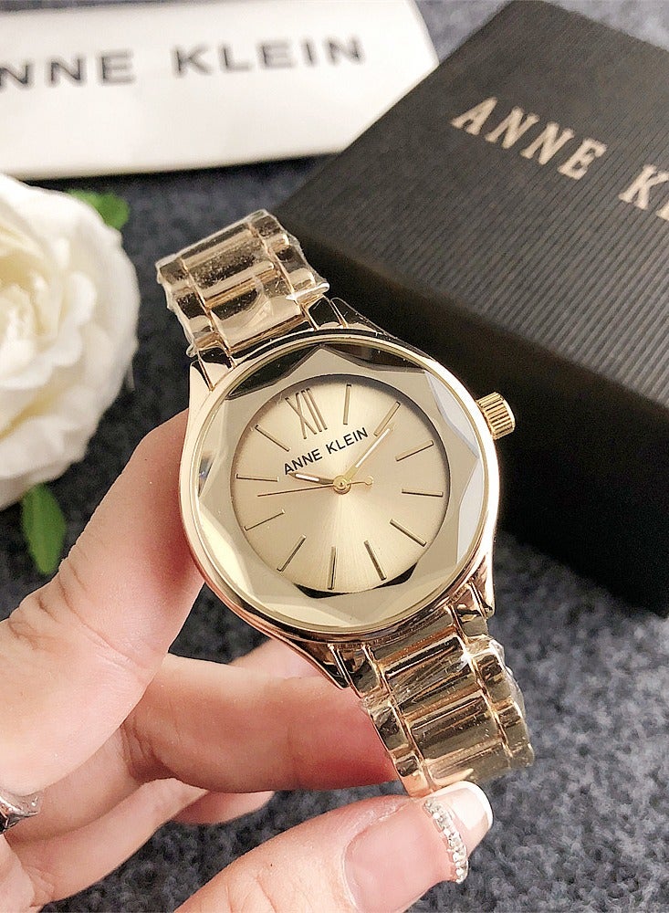 آن كلاين ساعة آن كلاين تونيو سيمبليسيتي الذهبية الأنيقة للنساء مع حزام من الفولاذ المقاوم للصدأ باللون الذهبي - Image 1